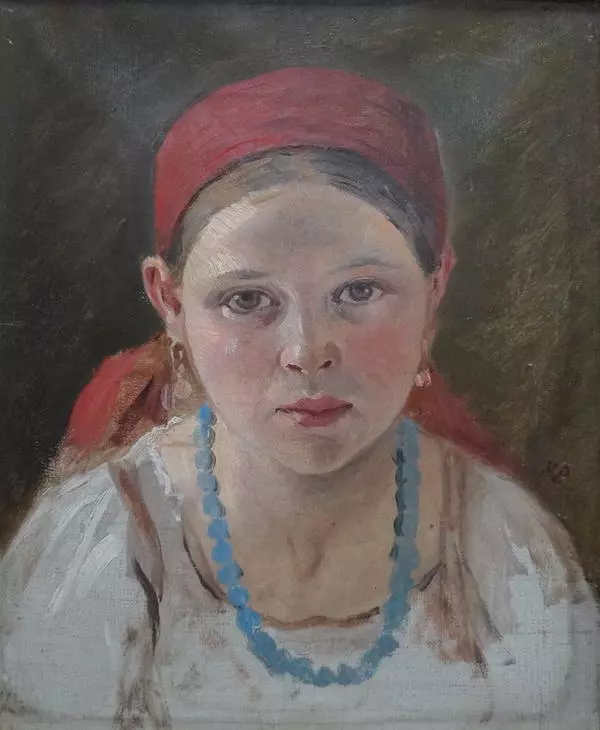 Девочка с голубыми бусами