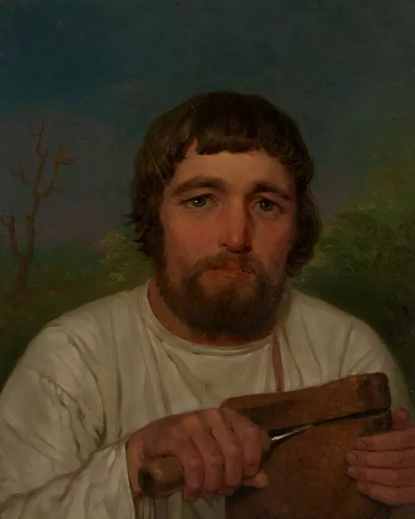 Крестьянин, отрезающий ломоть хлеба